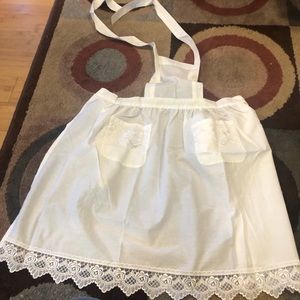 Aprons for girls. 3, like new. Never worn just out of pack.